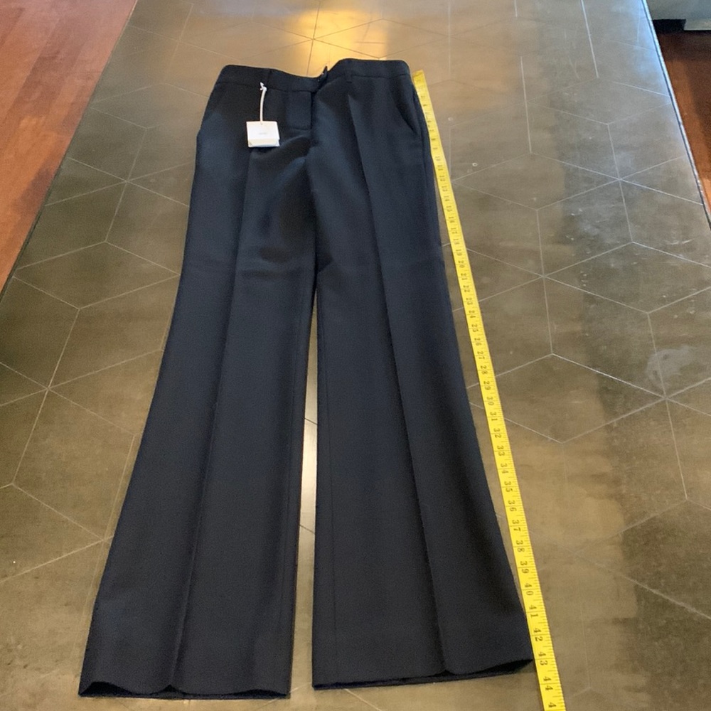 Moschino black dress slacks never worn.  Size 4 with 43” L.